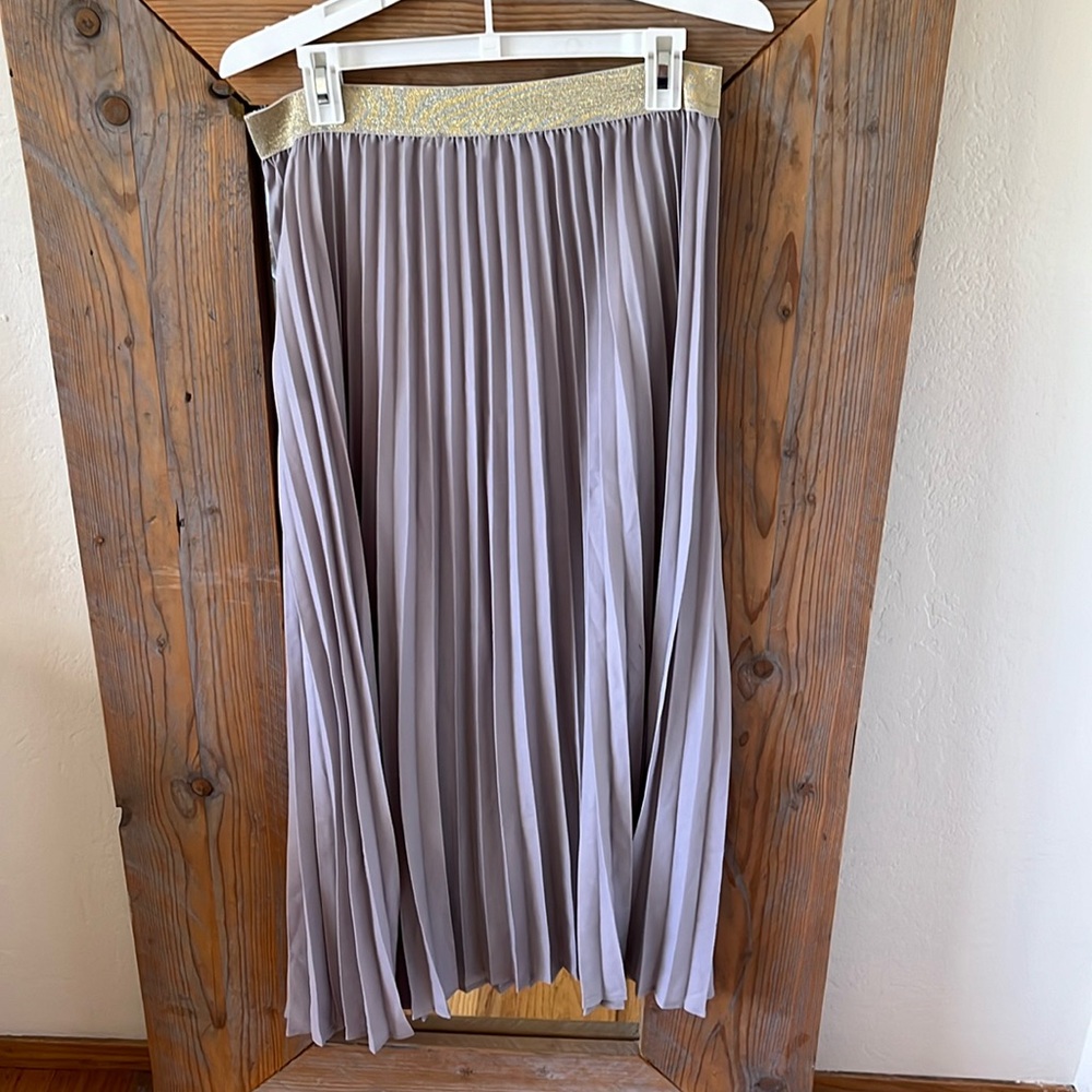 European style pleated maxi skirt with gold band. Size 38-40